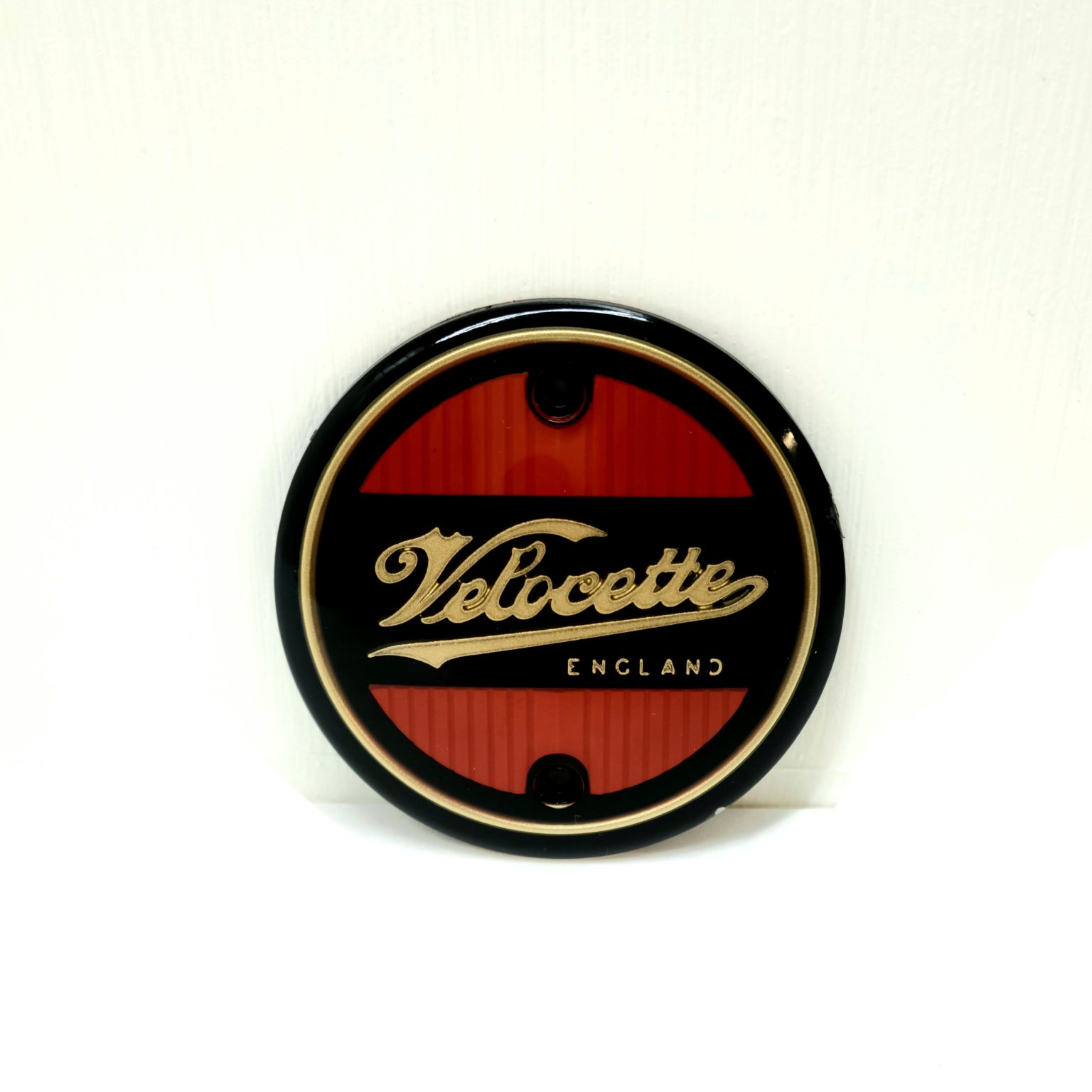 Velocette Round Badge – Black / Red / Gold – Made in UK – Baxter Cycle